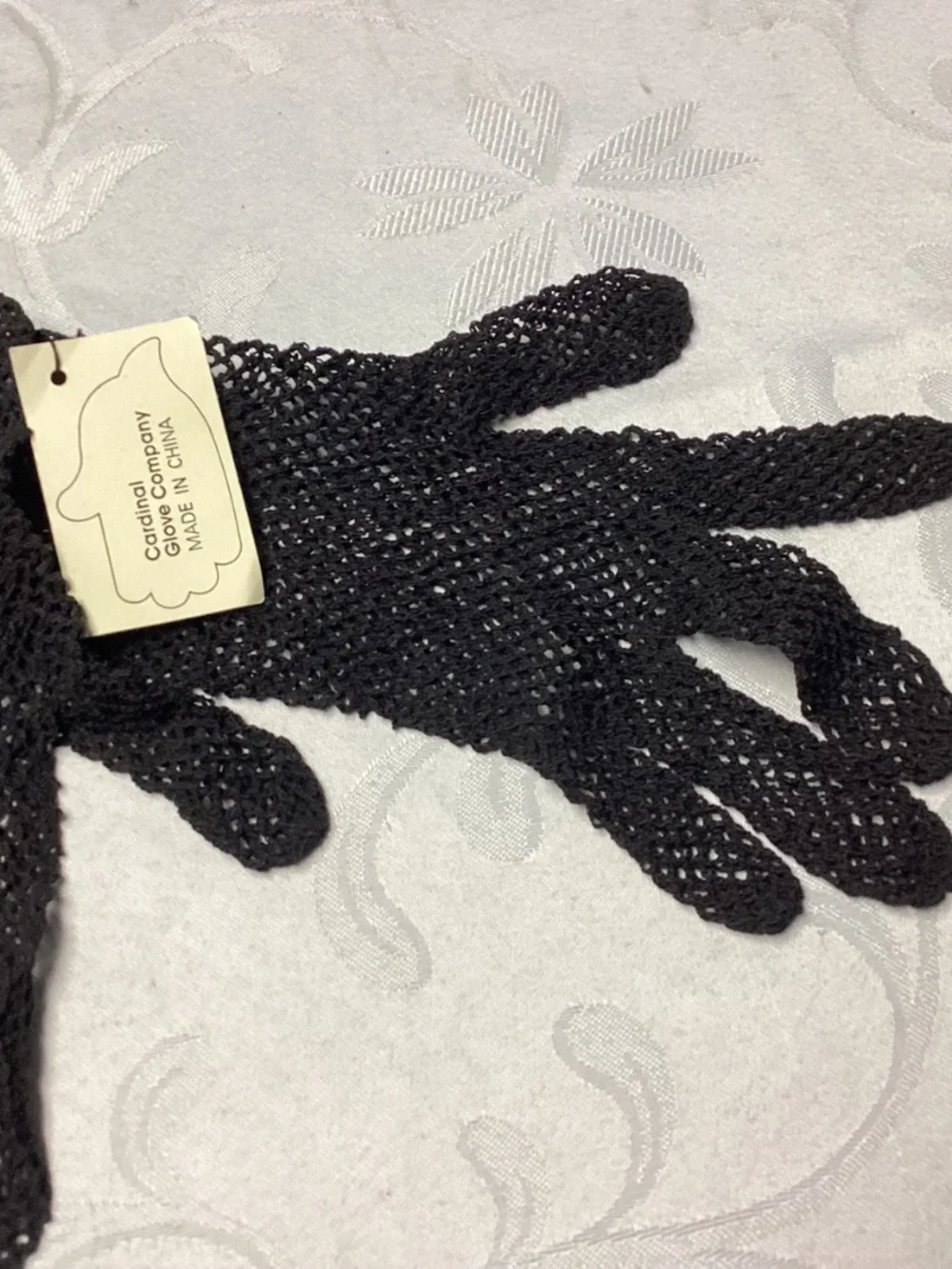 Black fishnet gloves never worn absolutely gorgeous. Detailed